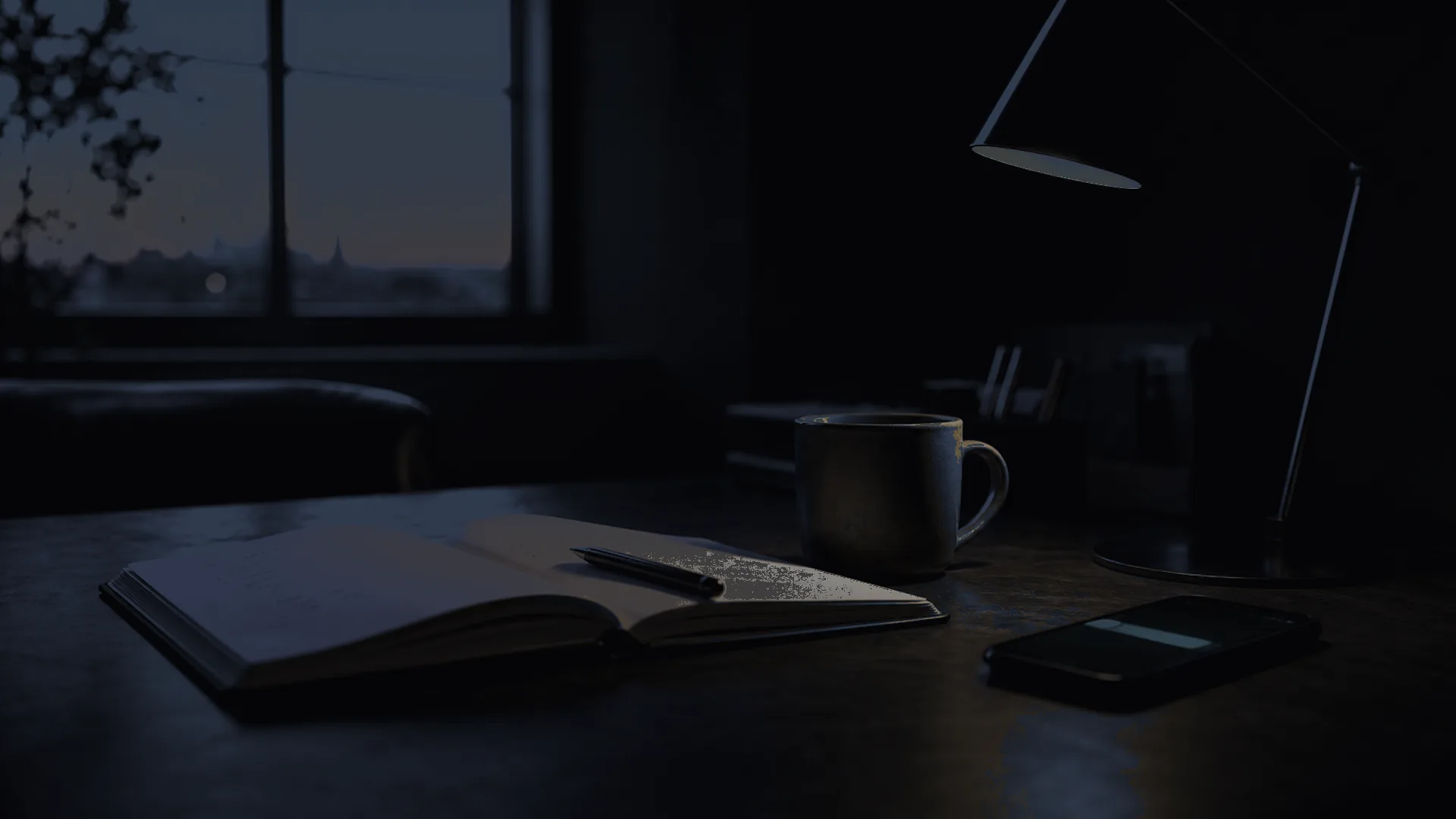 A quiet morning workspace: open notebook, plain coffee mug, pen, and a single desk lamp throwing warm light against cool shadow.